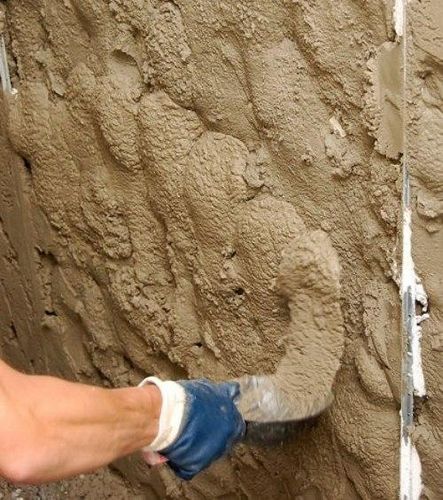 Как штукатурить стены цементным раствором?